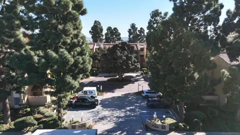 a view of a street with some trees