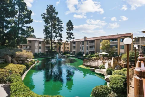 an aerial view of house with yard swimming pool and outdoor seating