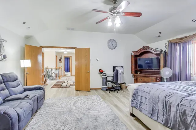 a bathroom with a sink double vanity and a mirror