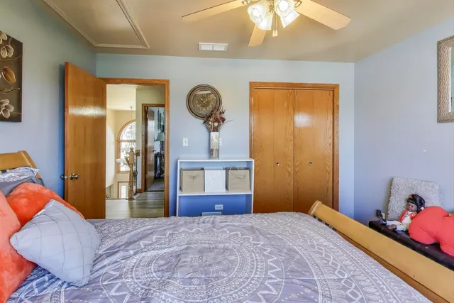 a bathroom with a sink vanity mirror and toilet