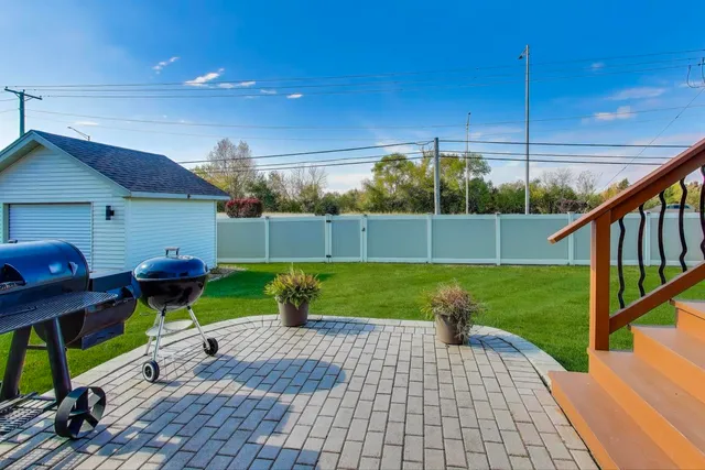 a house view with a garden space