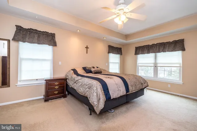 a room with a sink and a mirror