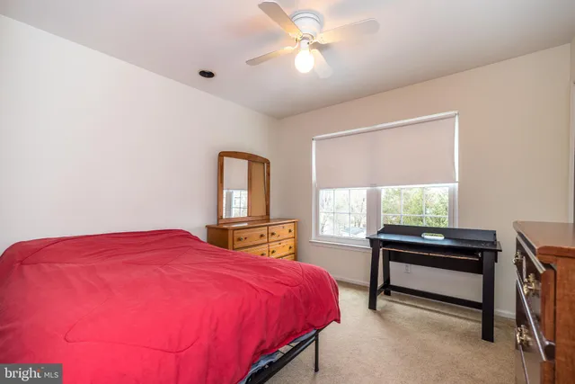 a view of a balcony with table and chairs