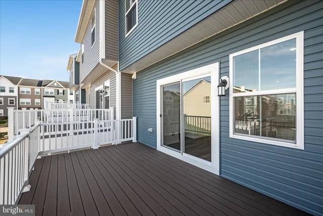 a front view of a house with a garage