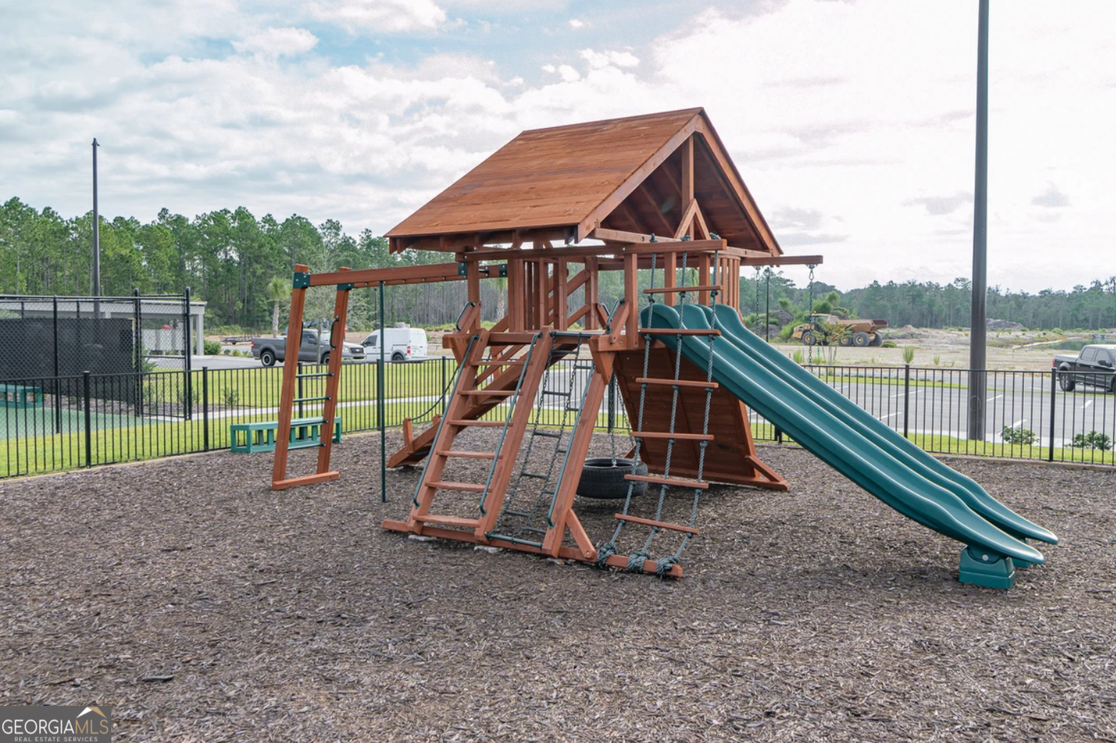 214 Collin Nicholas Drive Kingsland, GA 31548 - Photo 7 of 8 a view of a house with a park