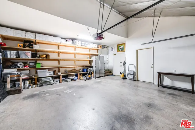 a view of a lake with a house in the background