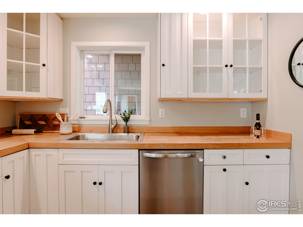 2350 Panorama Avenue Boulder, CO 80304 - Photo 12 of 39 a kitchen with a sink window and cabinets