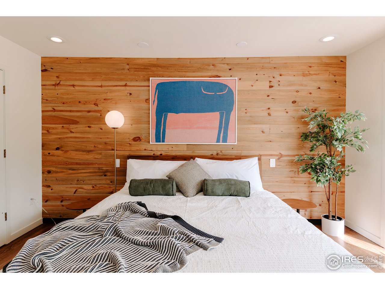 2350 Panorama Avenue Boulder, CO 80304 - Photo 17 of 39 a bedroom with a bed and a potted plant