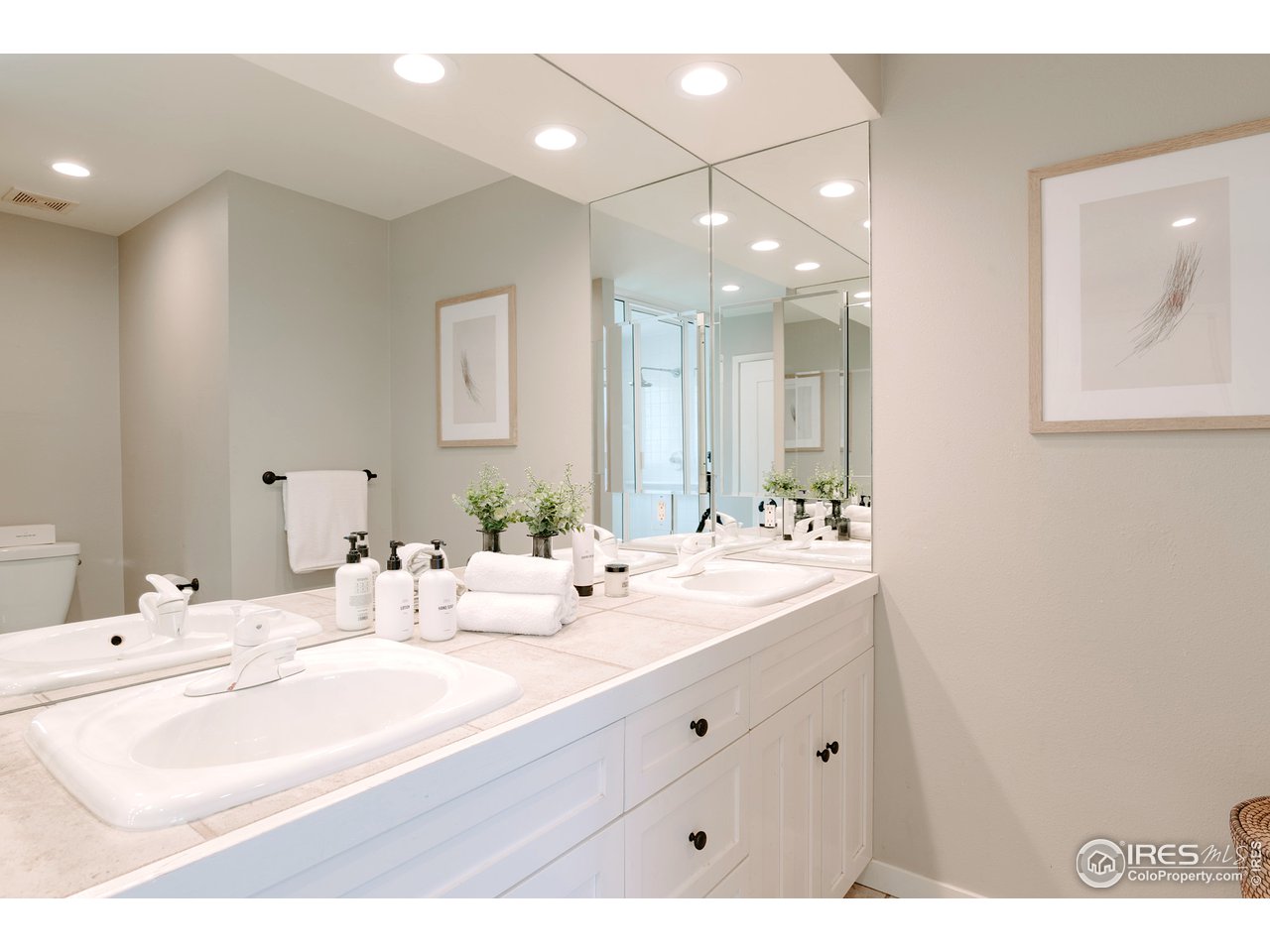2350 Panorama Avenue Boulder, CO 80304 - Photo 20 of 39 a bathroom with a sink vanity and mirror