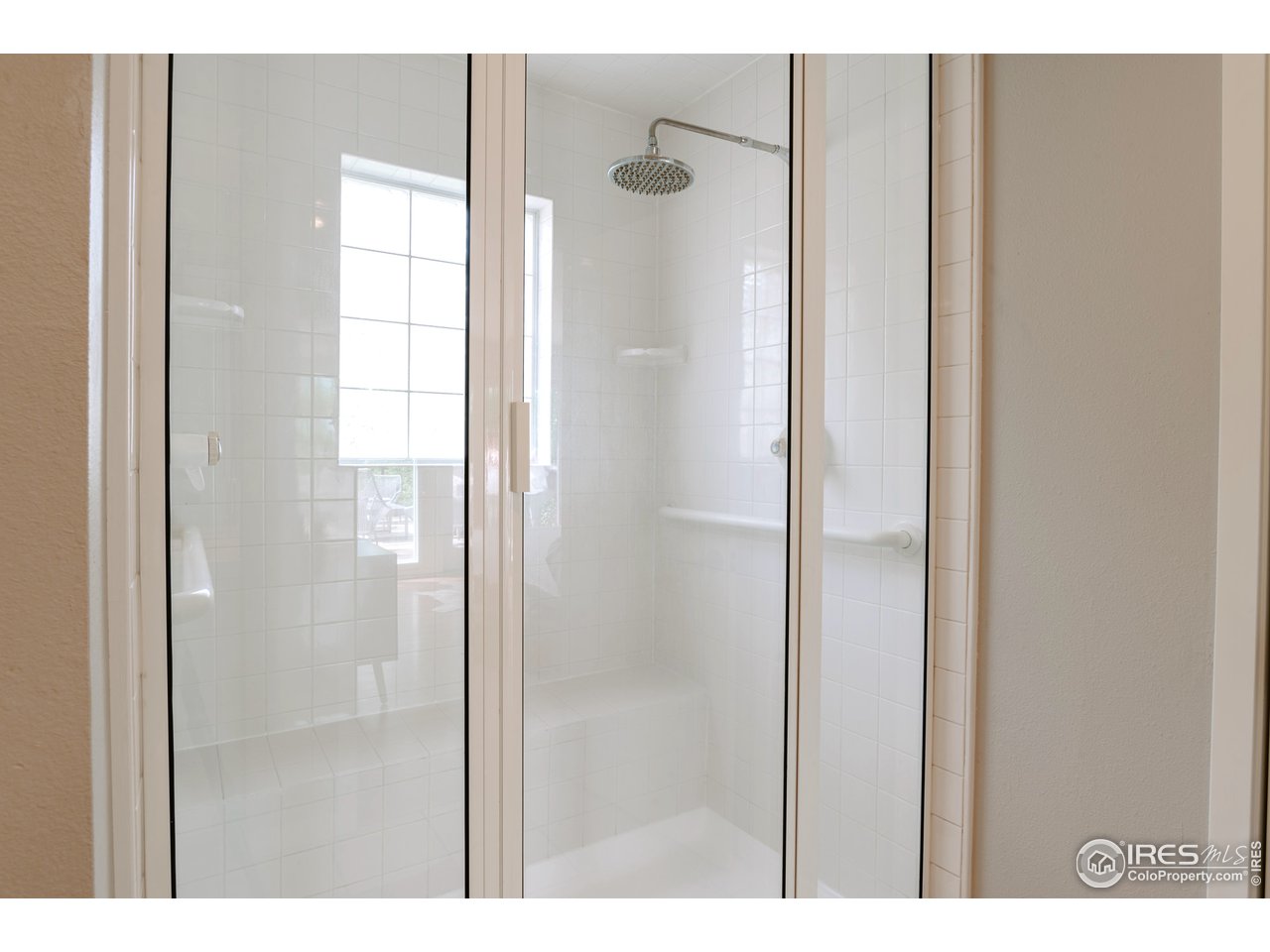 2350 Panorama Avenue Boulder, CO 80304 - Photo 21 of 39 a bathroom with a glass shower door