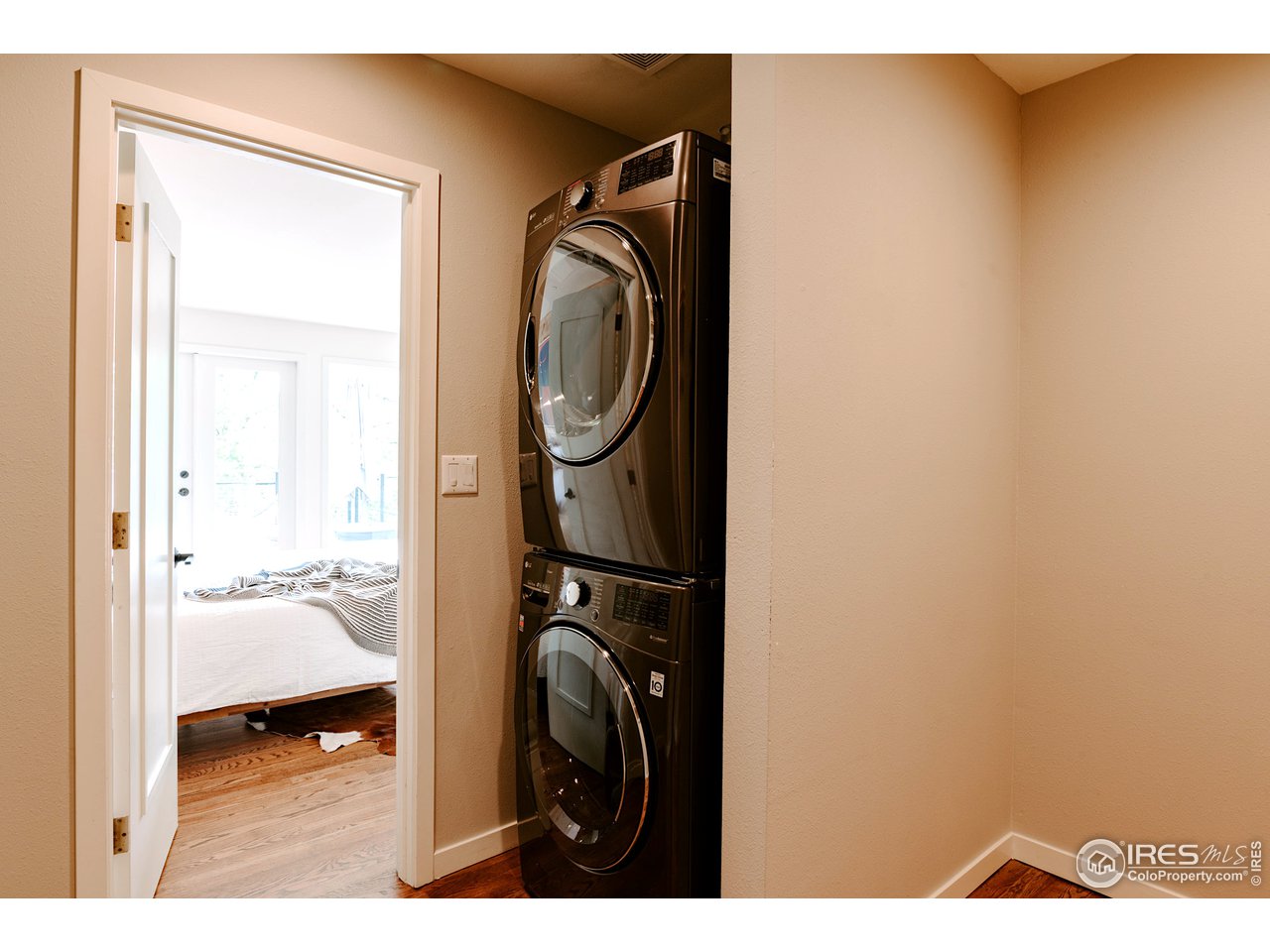 2350 Panorama Avenue Boulder, CO 80304 - Photo 22 of 39 a view of a bedroom with washer and dryer