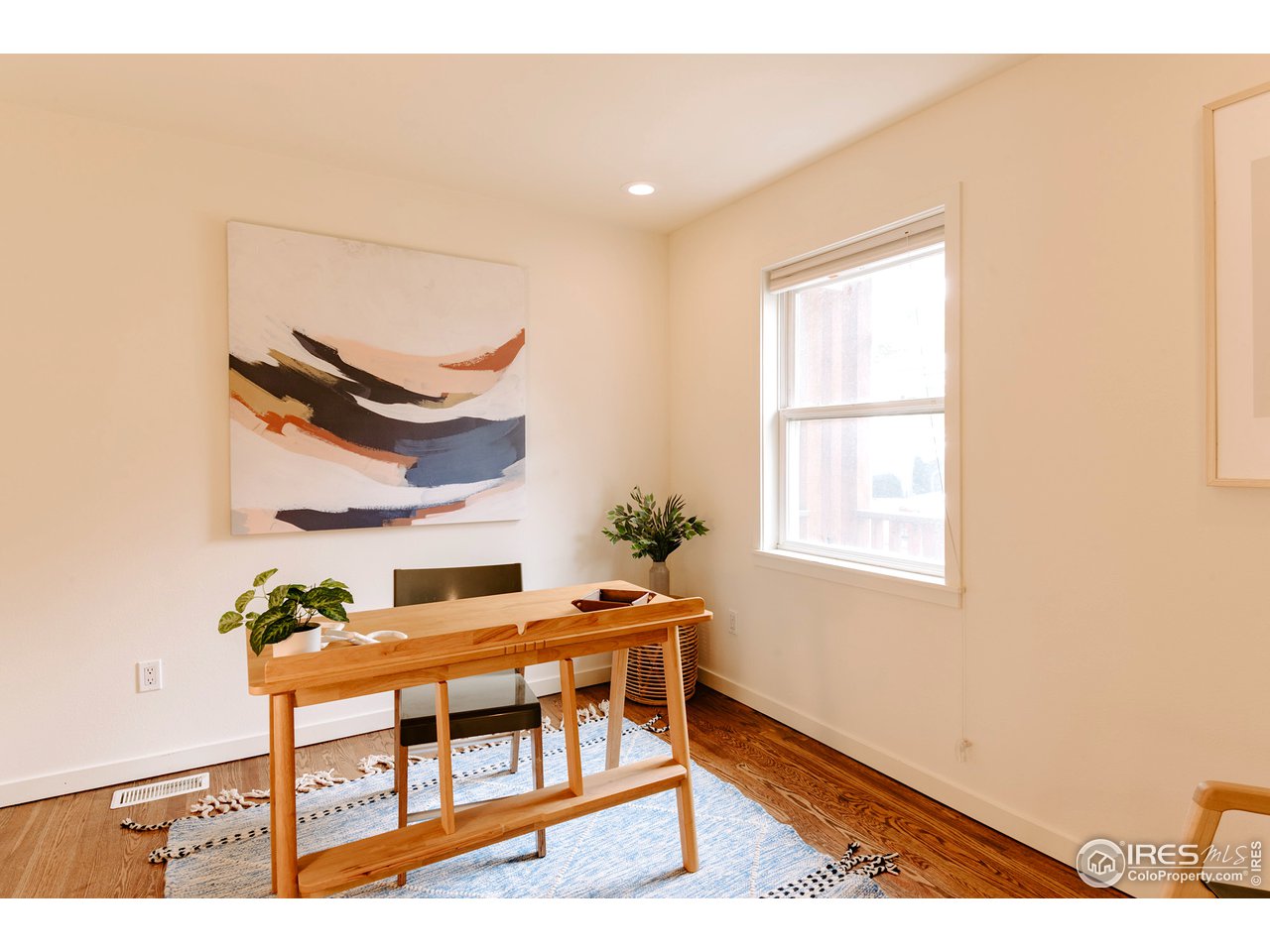 2350 Panorama Avenue Boulder, CO 80304 - Photo 24 of 39 a dining room with a wooden table and chairs