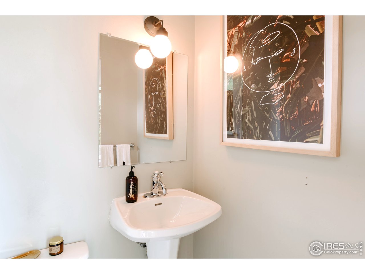 2350 Panorama Avenue Boulder, CO 80304 - Photo 26 of 39 a bathroom with a sink and mirror