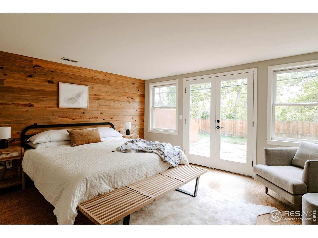 2350 Panorama Avenue Boulder, CO 80304 - Photo 29 of 39 a bedroom with a large bed and a couch