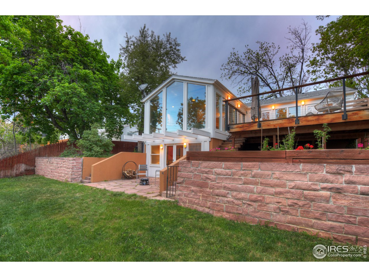 2350 Panorama Avenue Boulder, CO 80304 - Photo 33 of 39 a view of a house with a yard porch and sitting area