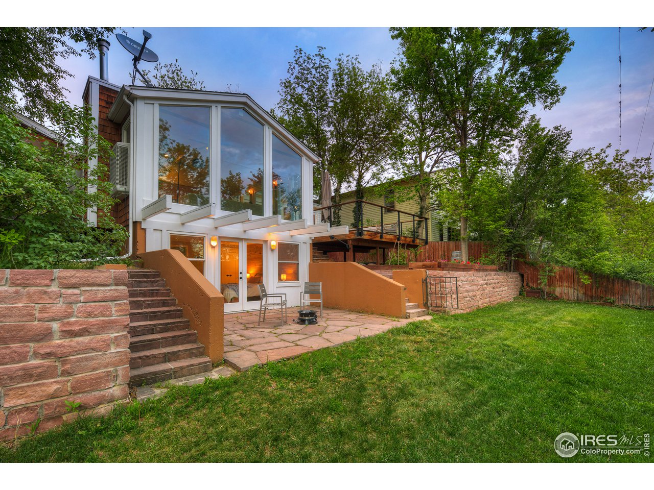2350 Panorama Avenue Boulder, CO 80304 - Photo 35 of 39 a view of a house with a yard porch and sitting area