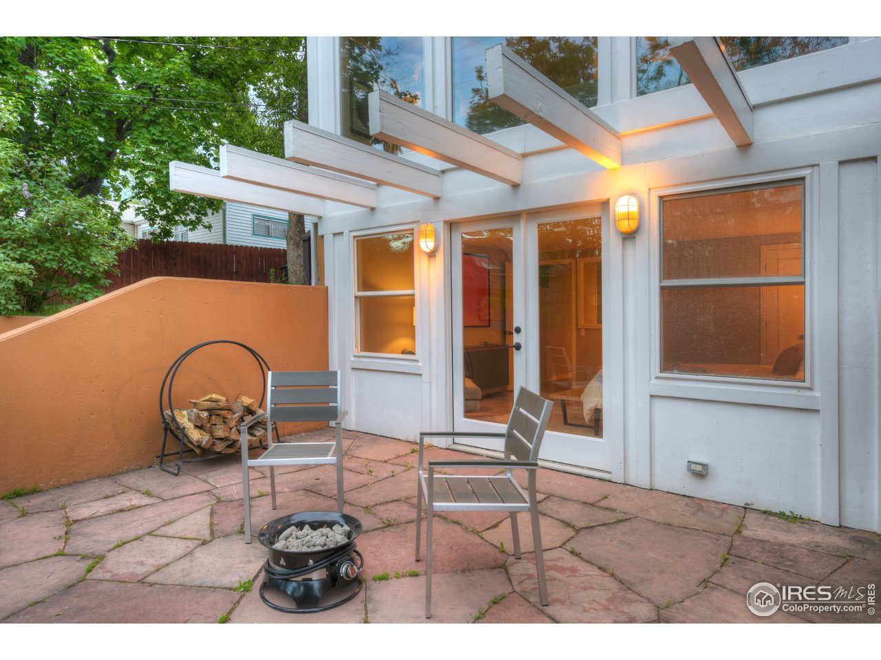 2350 Panorama Avenue Boulder, CO 80304 - Photo 36 of 39 a backyard of a house with table and chairs