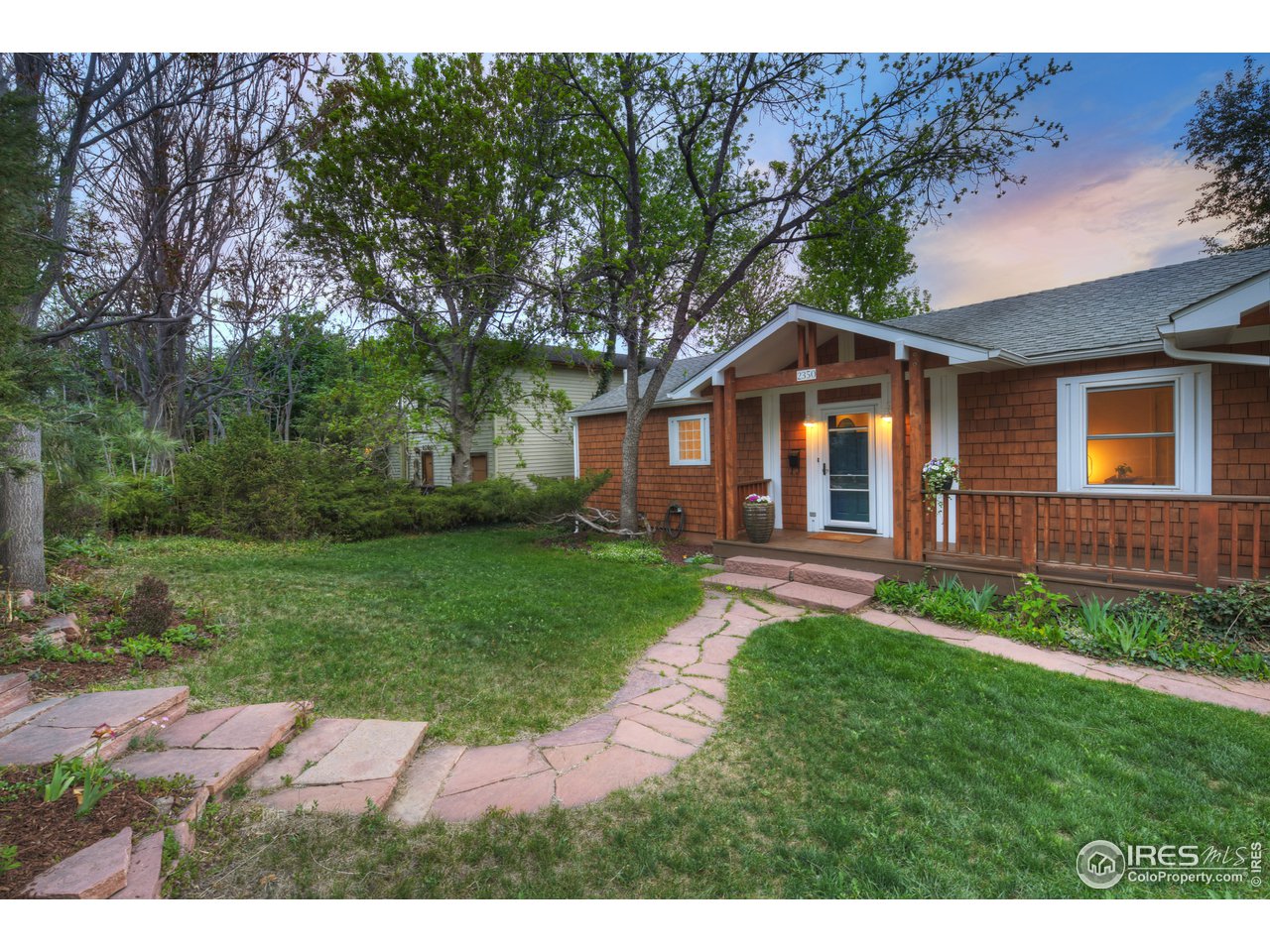 2350 Panorama Avenue Boulder, CO 80304 - Photo 4 of 39 a front view of a house with a yard