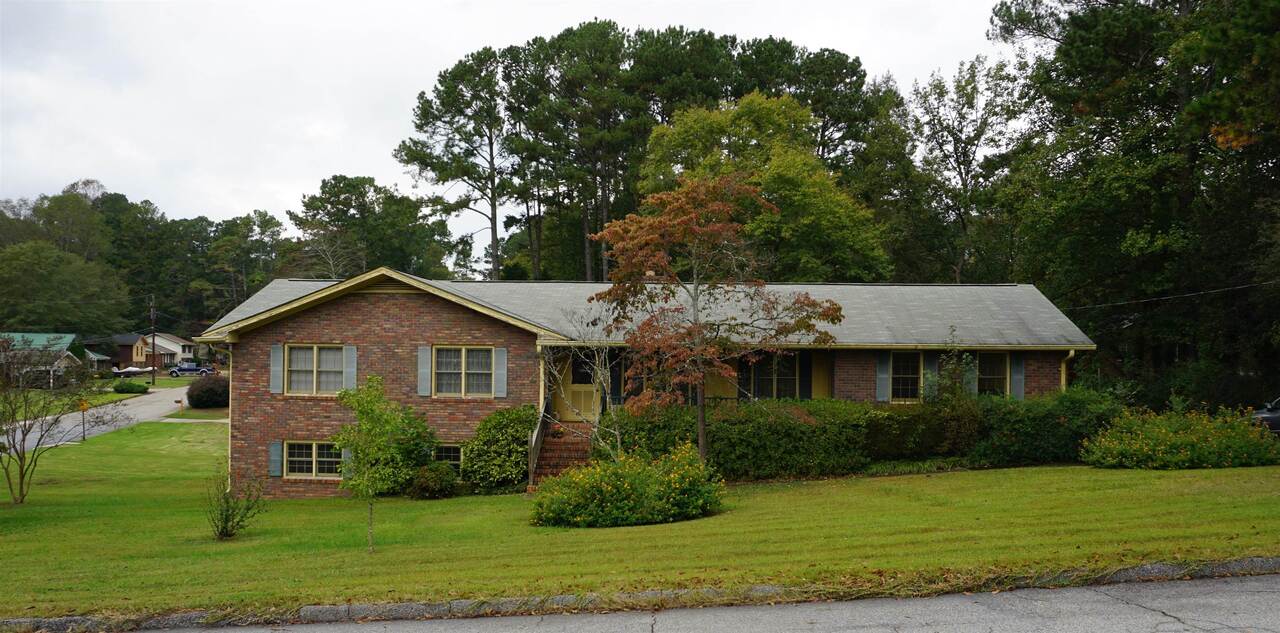 181 Colonial Hills Road Winder, GA 30680 - Photo 1 of 1 a front view of a house with a yard
