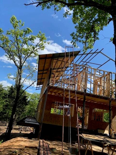 924 The Oil Road Gainesville, TX 76240 - Photo 38 of 39 Erecting Walls and Roof