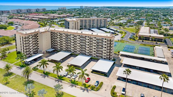 an aerial view of multi story residential apartment building