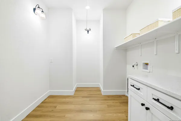 a view of room with hardwood floor