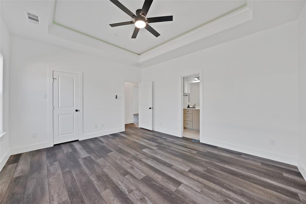 175 Harris Harbor Road East Tawakoni, TX 75472 - Photo 13 of 22 a view of empty room with wooden floor