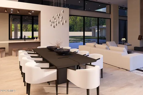 a view of a dining room with furniture and window