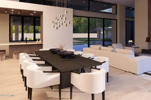 a view of a dining room with furniture and window