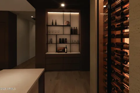 a kitchen with a table and chairs