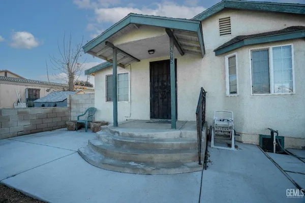 a view of a house with a patio