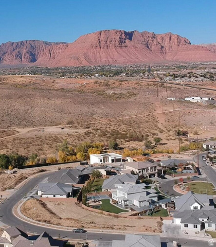 231 Colbey Loop Santa Clara, UT 84765 - Photo 1 of 4 View of mountain backdrop with nearby suburban area