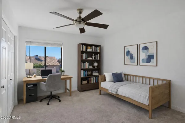 a living room with furniture and a window