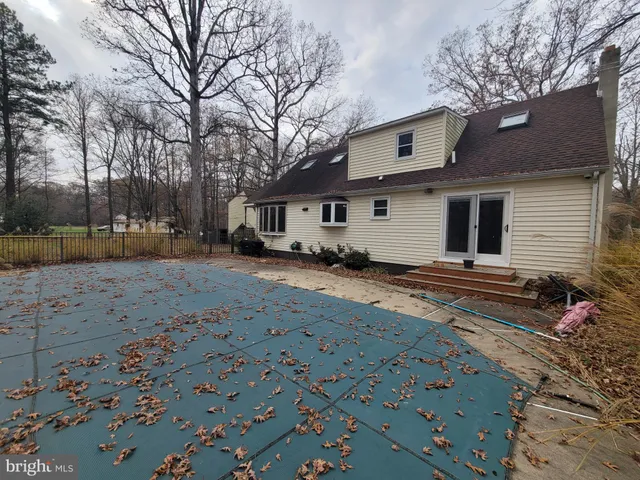 a house view with a backyard space