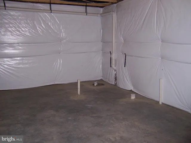 a view of a room with an empty space