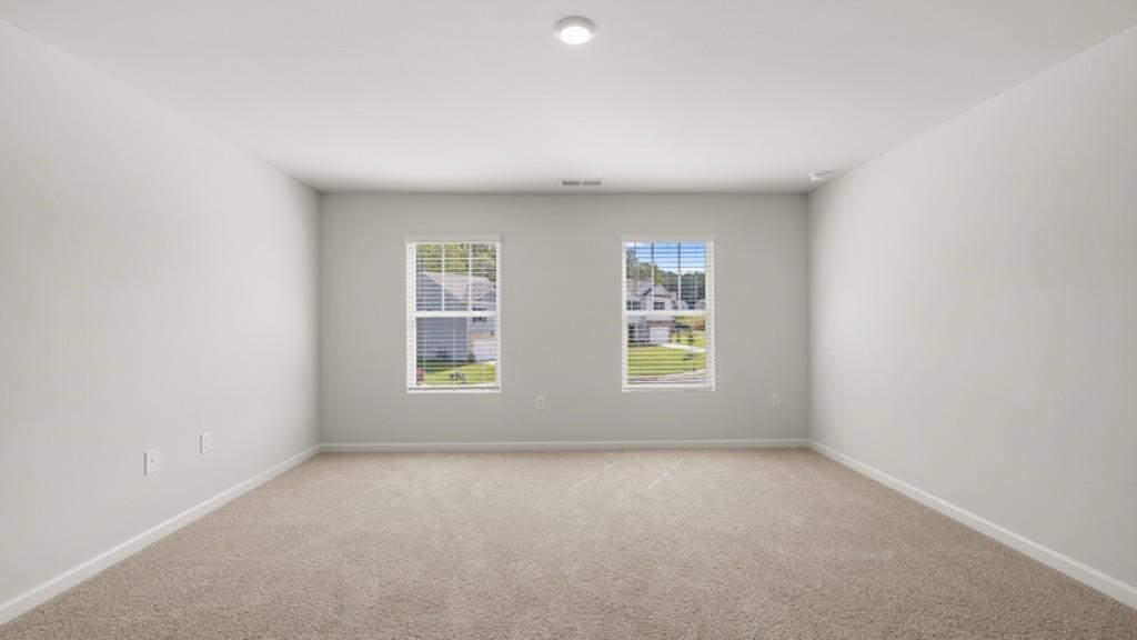 109 Glenrise Road Dallas, GA 30157 - Photo 19 of 33 an empty room with windows