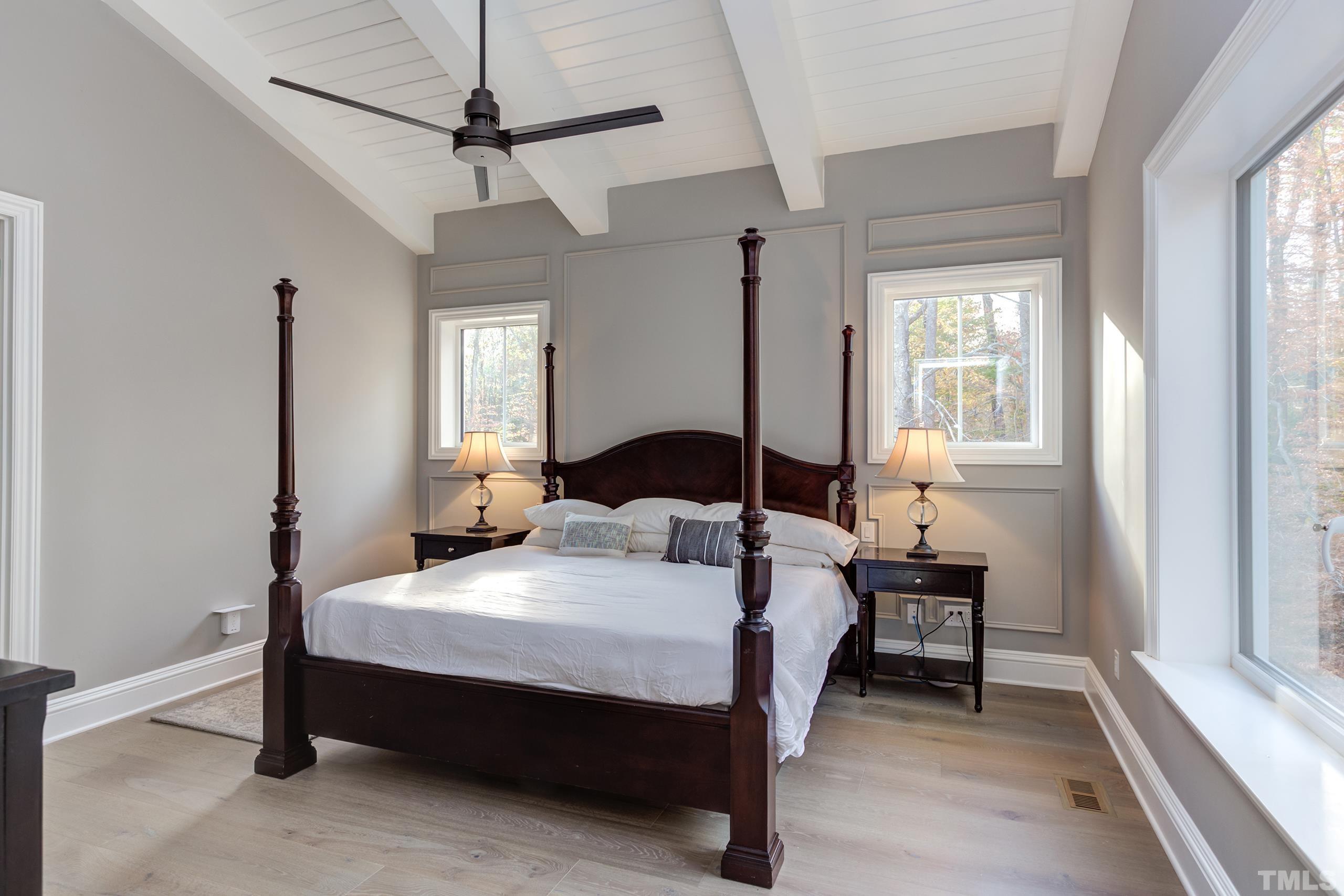 8009 Ghost Pony Trail Raleigh, NC 27613 - Photo 20 of 55 a bedroom with bed and a window