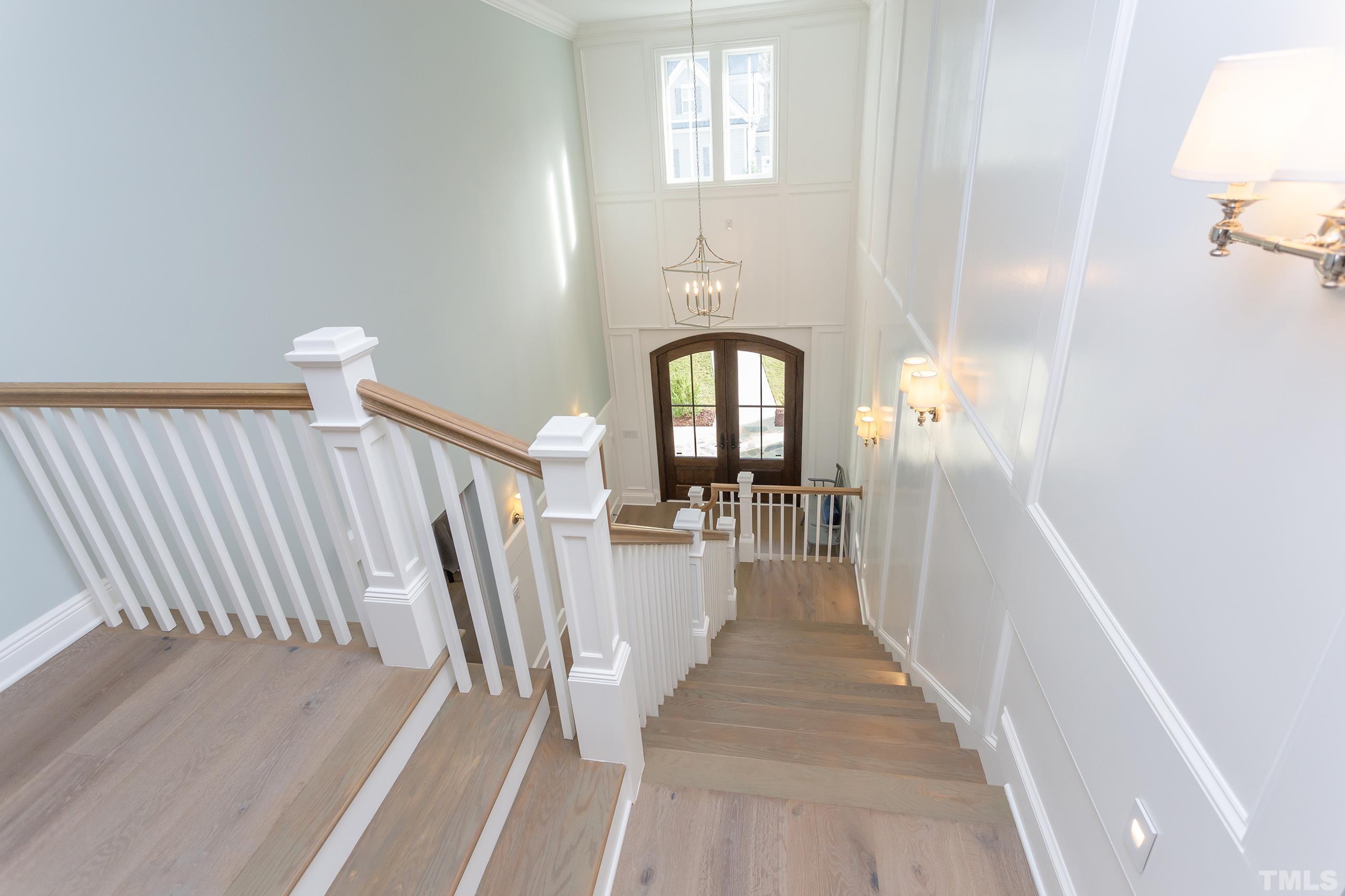 8009 Ghost Pony Trail Raleigh, NC 27613 - Photo 32 of 55 a view of entryway and hall with wooden floor