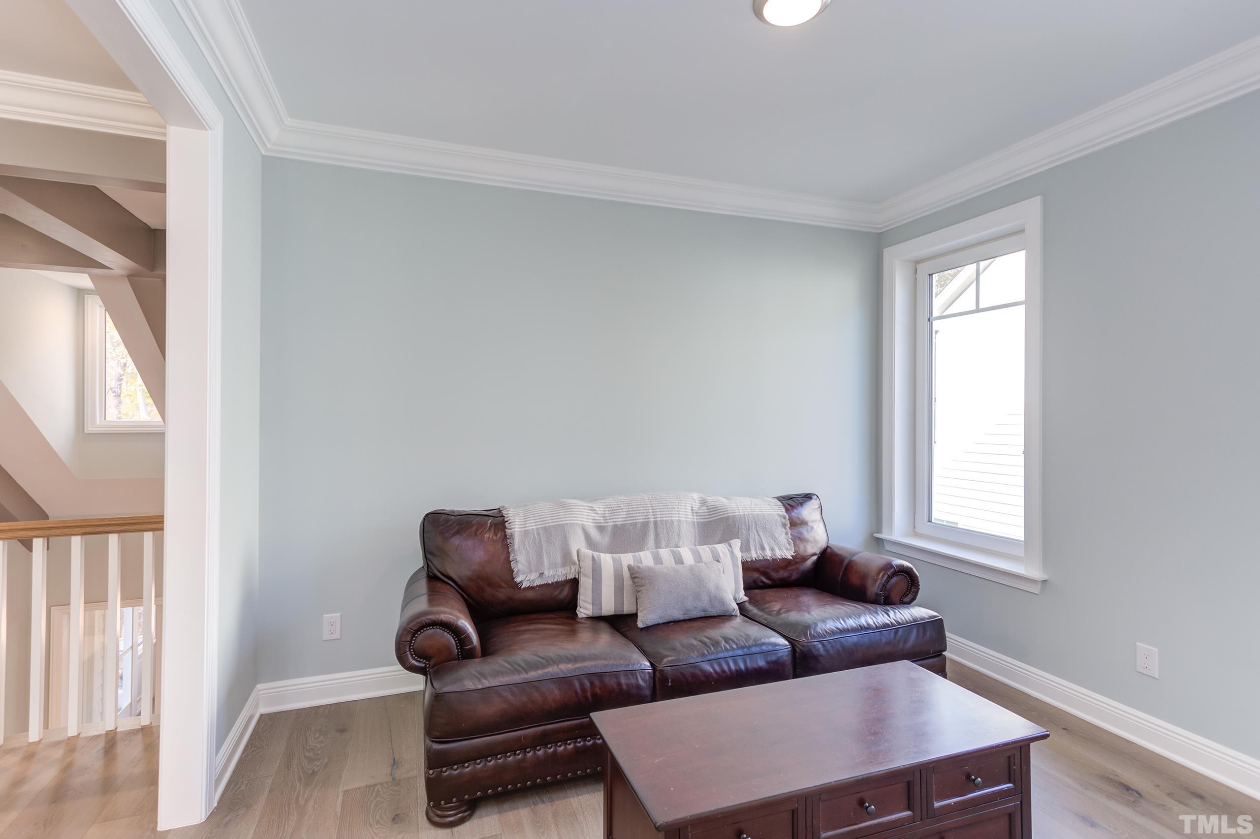 8009 Ghost Pony Trail Raleigh, NC 27613 - Photo 35 of 55 a living room with furniture and a window