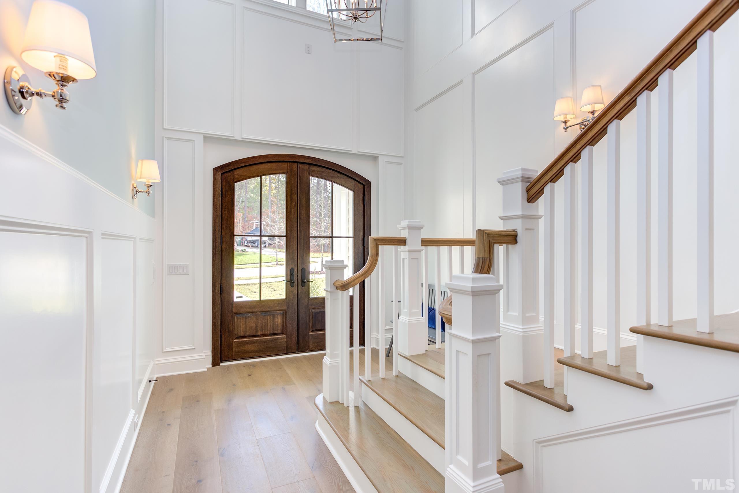 8009 Ghost Pony Trail Raleigh, NC 27613 - Photo 4 of 55 a view of front door with hallway