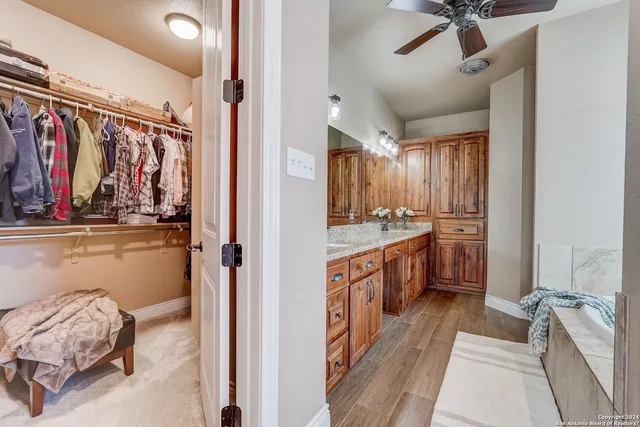 a bathroom with a tub and a window