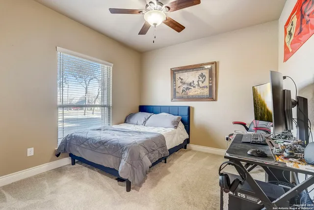 a view of a city with lush green forest