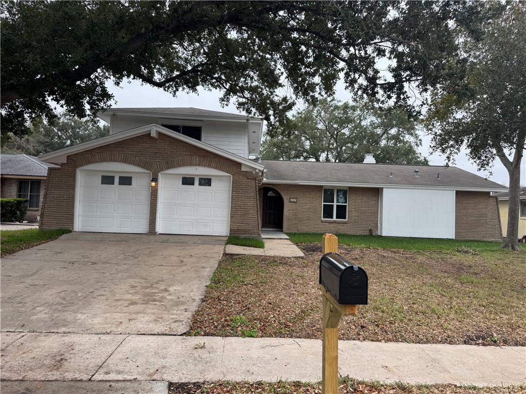 4509 Hogan Street Corpus Christi, TX 78413 - Photo 1 of 27 front view of a house with a yard
