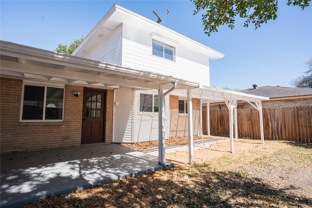 4509 Hogan Street Corpus Christi, TX 78413 - Photo 24 of 27 a view of a house with a yard