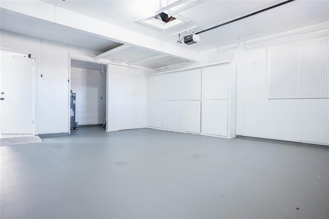 4509 Hogan Street Corpus Christi, TX 78413 - Photo 25 of 27 an empty room with a ceiling fan and entryway
