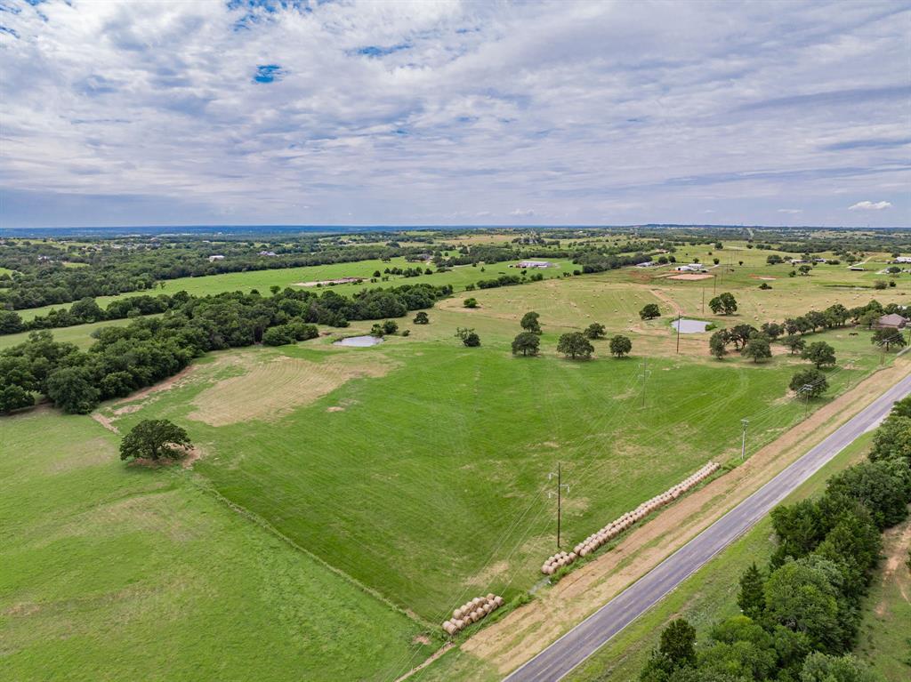 730 North St Decatur Tx 76234 Decatur, TX 76234 - Photo 1 of 17 a view of a lush green field
