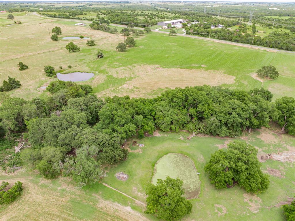730 North St Decatur Tx 76234 Decatur, TX 76234 - Photo 14 of 17 a view of a lake with a beach
