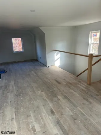 a view of a hallway with staircase