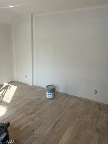 a room with gym equipment and a window