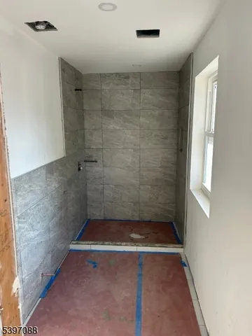 a view of a bathtub in bathroom